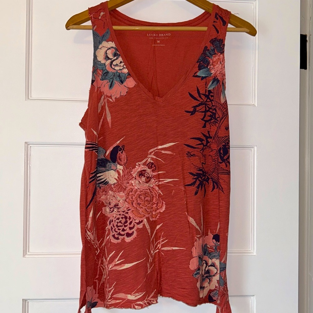 Lucky Brand tank in coral with print in front. V neck size medium